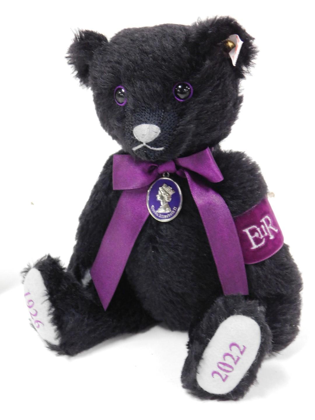 A Steiff Queen Elizabeth II memorial bear, number 6898, with certificate, and the Footprints in the - Image 3 of 5