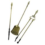 A set of three Victorian brass fire irons, comprising shovel, pair of fire tongs and a poker, 70cm h