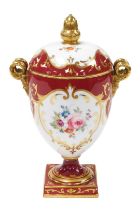 An early 20thC Wedgwood porcelain twin handled vase and cover, of footed ovoid form, with twin gilt