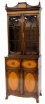 A mahogany and satinwood secretaire bookcase in George III style, the top with a shaped cornice and