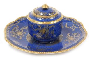 An late 19thC Copeland Spode pottery inkwell, on an integral stand, decorated with chinoiserie flowe