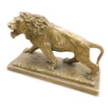 After Antoine Louis Barye (French, 1795-1875). Gilt plaster model of a walking lion, raised on a rec