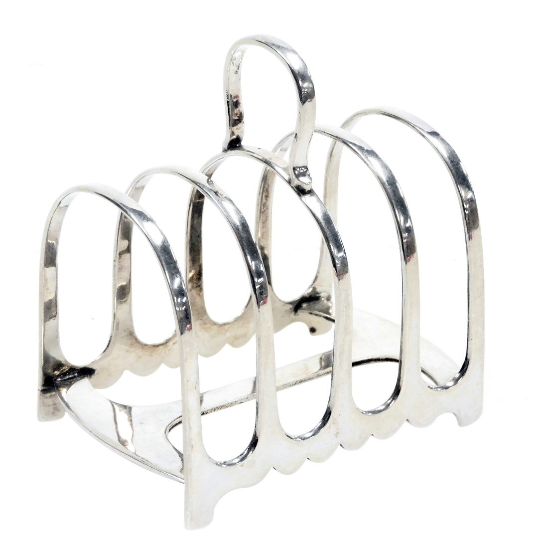 A George V silver four division toast rack, Birmingham 1913, 2.49oz.