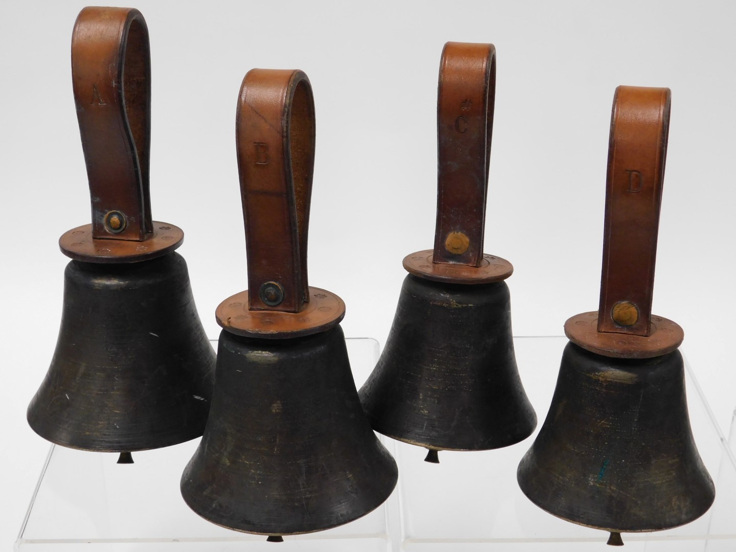 Twelve vintage graduated brass hand bells, with tan leather straps, denoting the note, cased. - Image 3 of 5