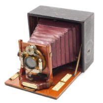 A late 19thC American mahogany and leather case box camera, by the Rochester Camera Company, the Cyc