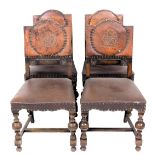 A set of four oak dining chairs, each with a brown leather back, embossed with a rose, within brass