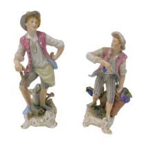 A 20thC Kammer Volkstedt porcelain figure of a gardener, raised on a rococo base, 20cm high, and a f