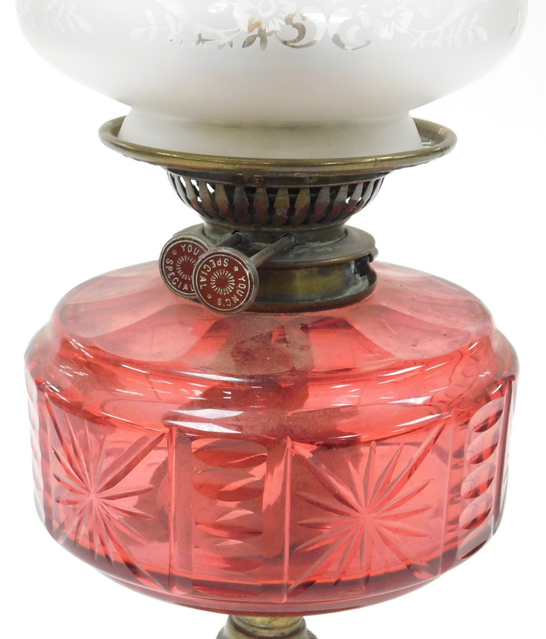 A late 19thC Young's brass oil lamp, with a cranberry glass reservoir, glass chimney and frosted to - Image 2 of 2