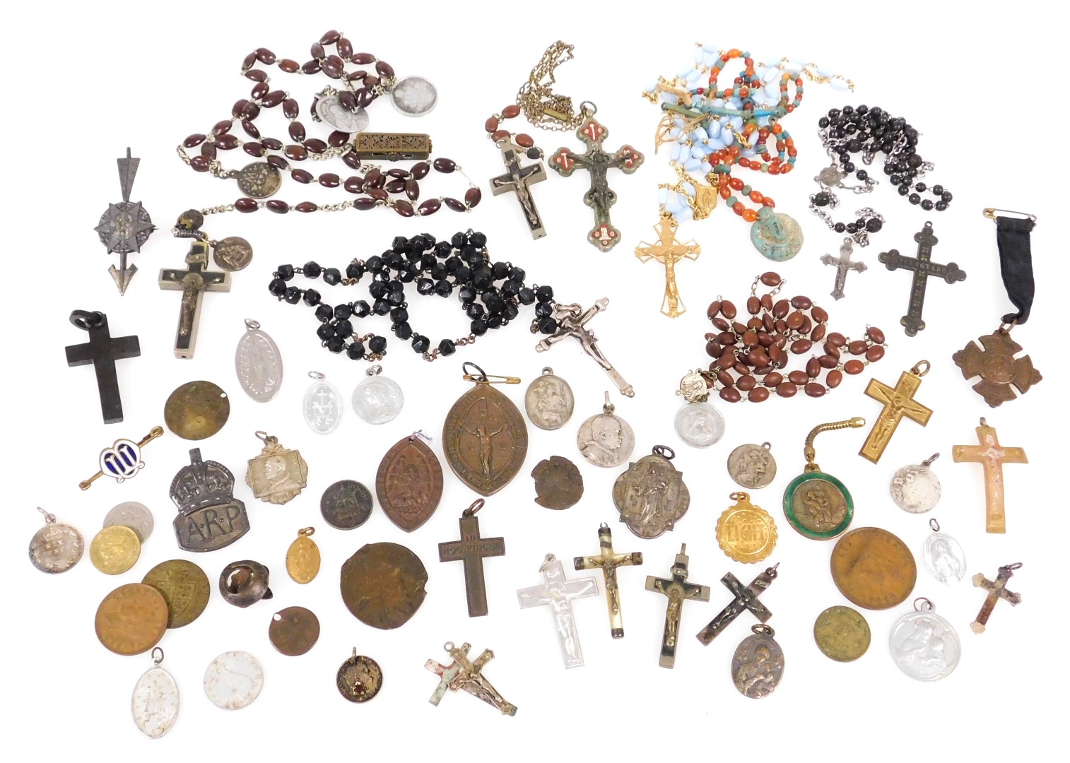 A group of rosaries, Catholic badges, George III spade guinea tokens, and other coins. (qty)