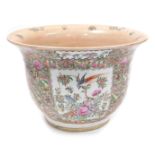 A Chinese Canton porcelain jardiniere, decorated with figures within floral borders, 32cm high, 48cm