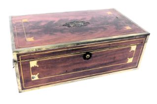 A Victorian mahogany brass bound and inlaid writing slope, the hinged lid opening to reveal a tooled