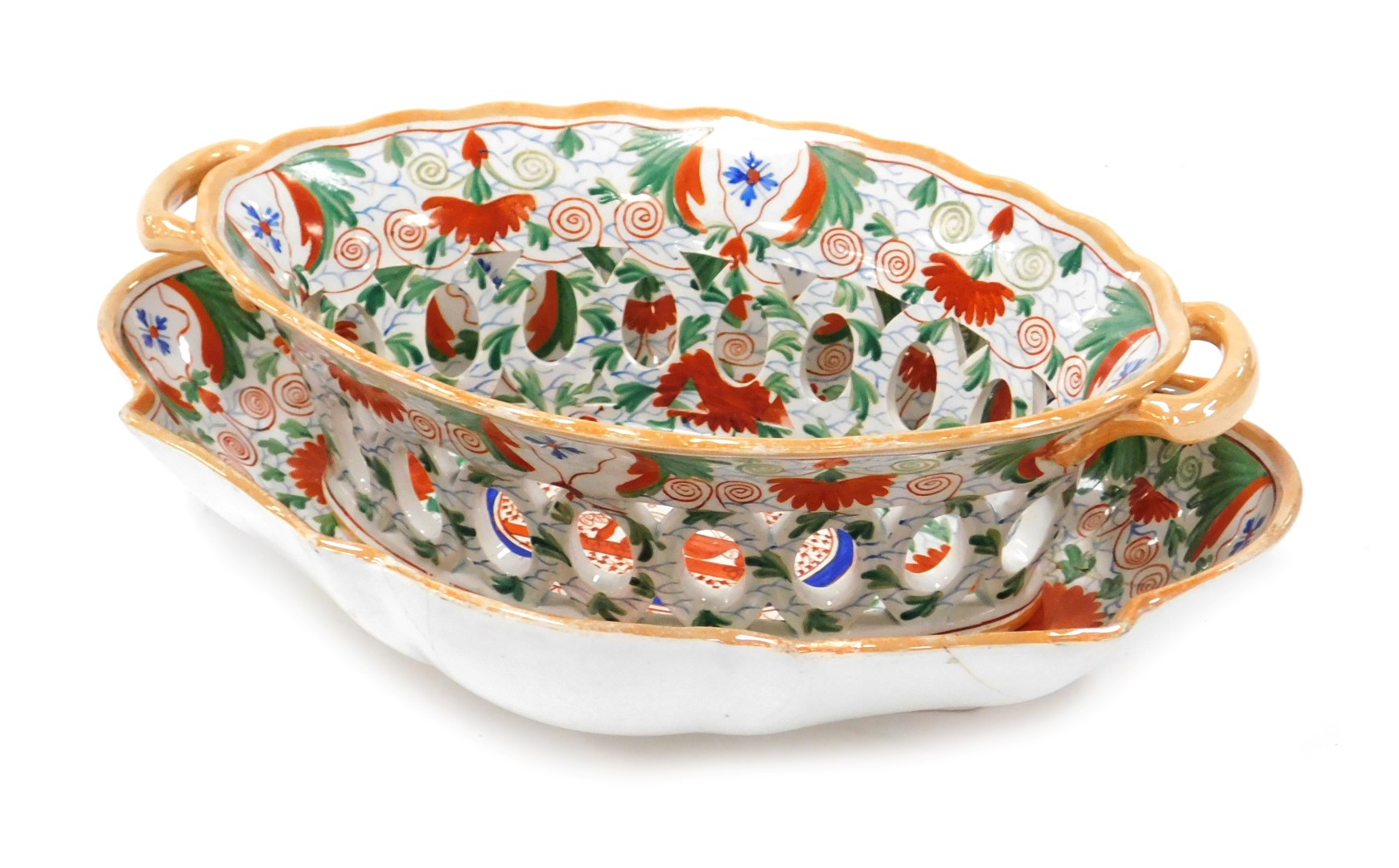 An early 19thC Spode pearlware Crazy Cow pattern chestnut basket on stand, pattern number 941, paint