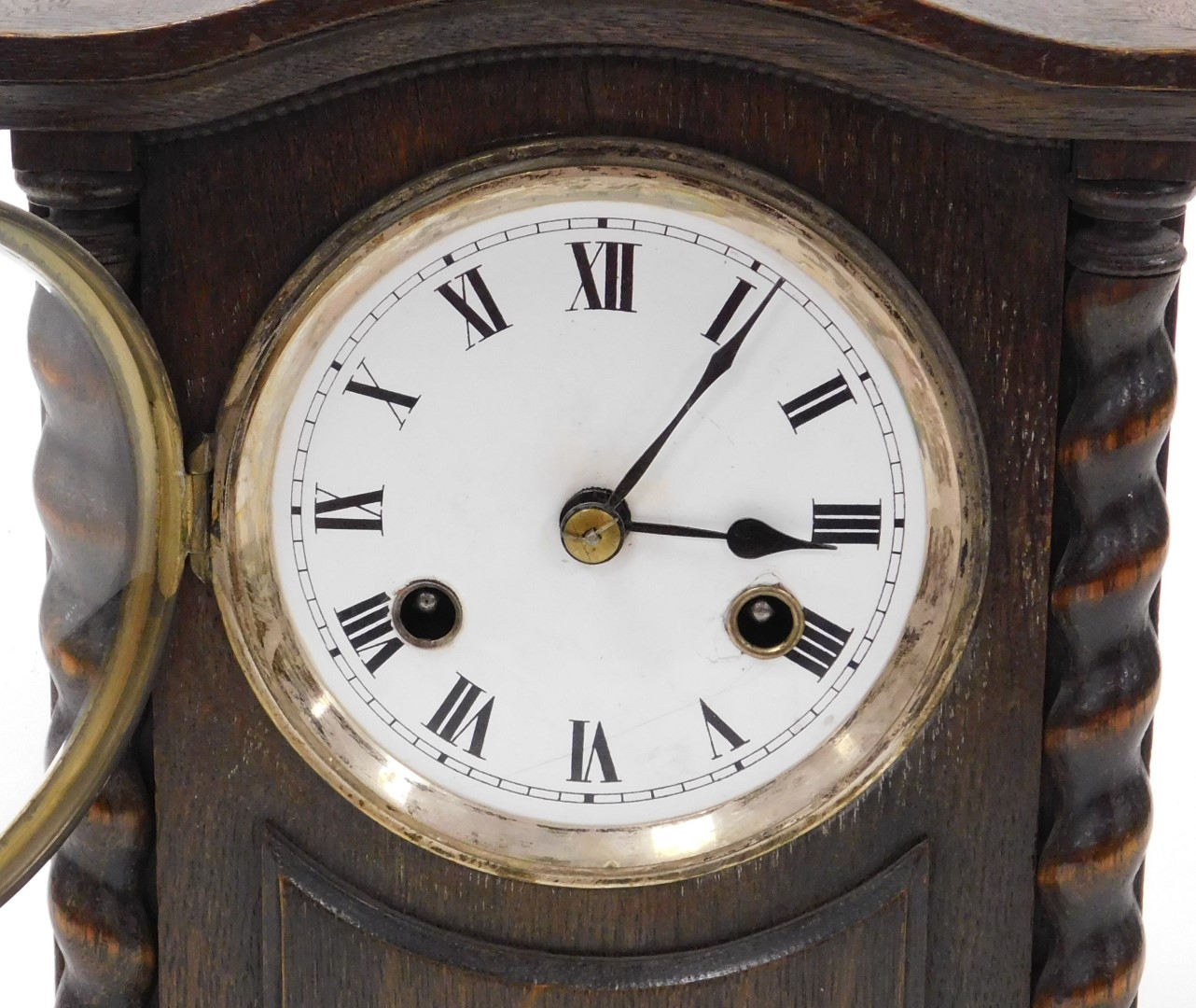 An early 20thC oak cased mantel clock, circular enamel dial bearing Roman numerals, eight day moveme - Image 2 of 3