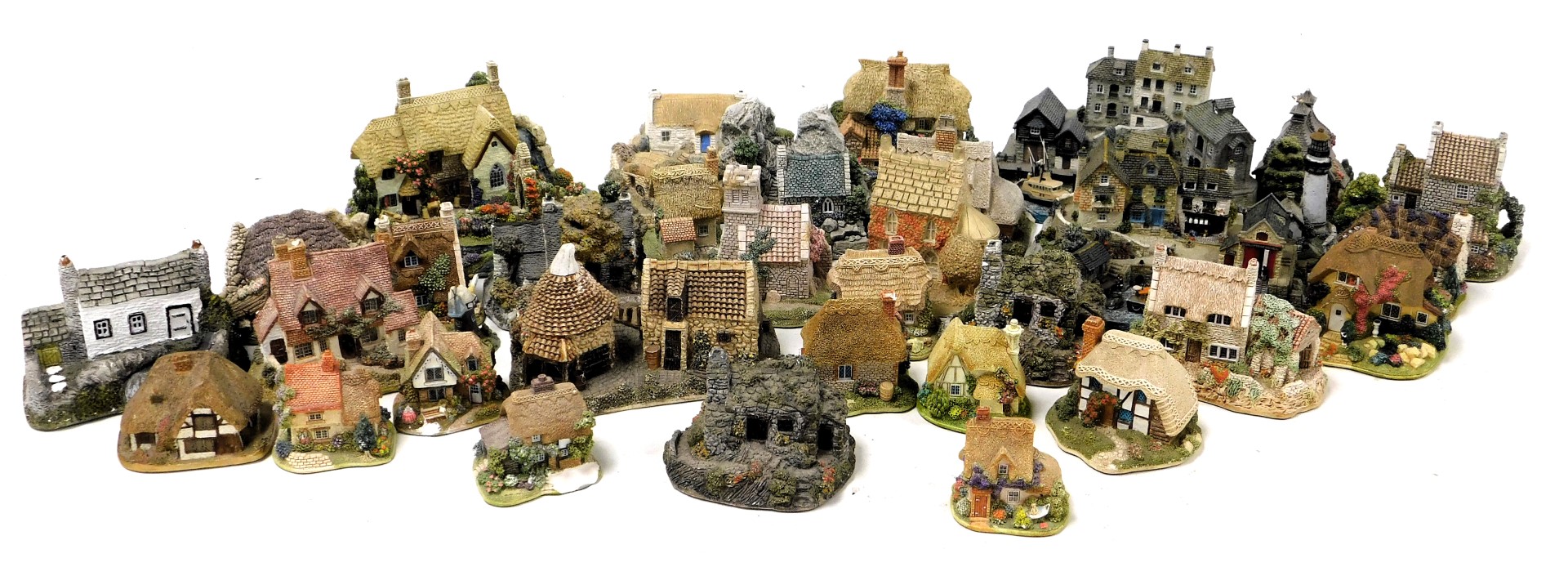 Lilliput Lane and other sculptures, including The Old Mill at Dunster, Cider Apple Cottage, Ballyker