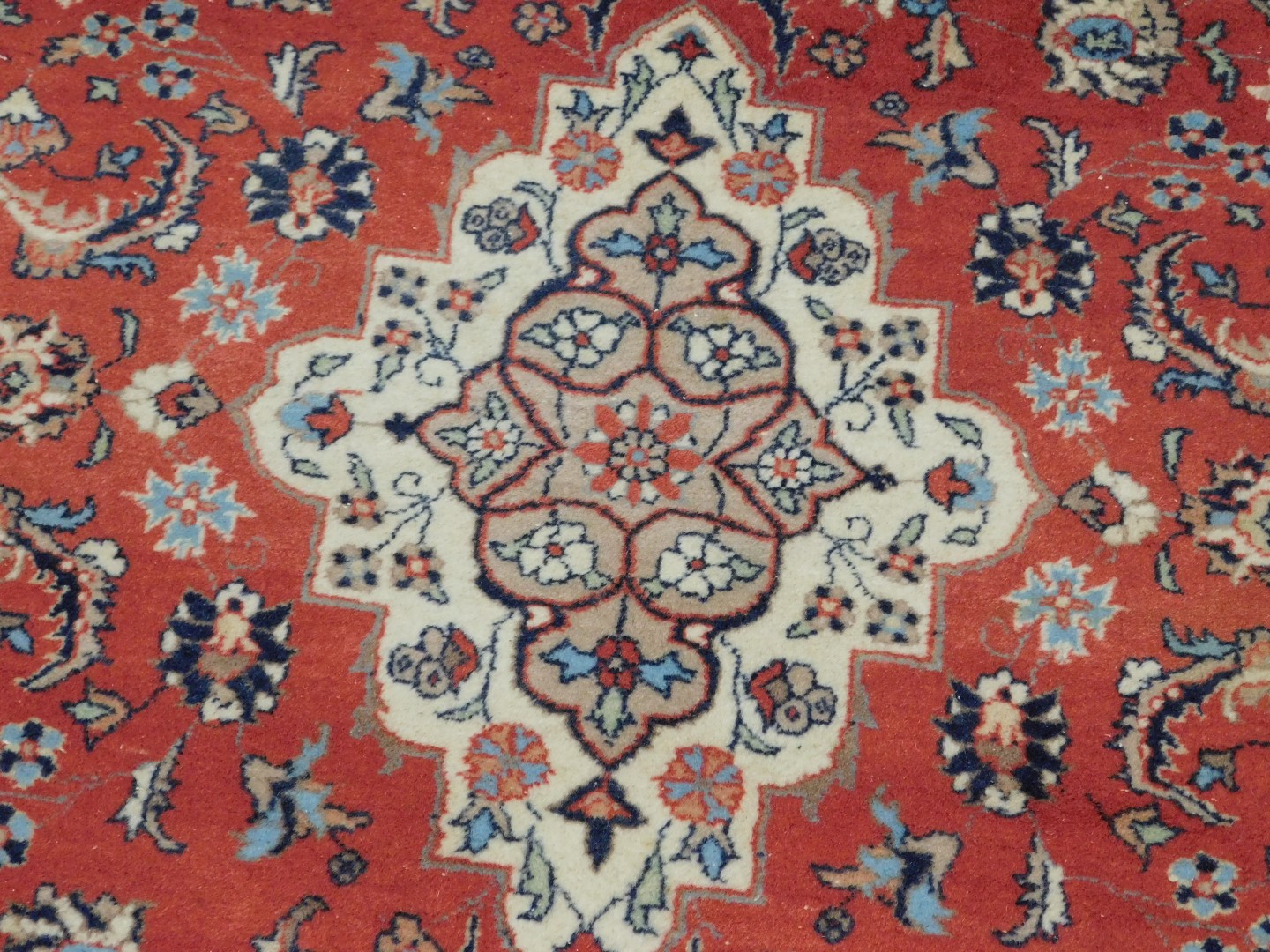 A Persian design rug, with central red ground gul, beige and grey borders, 195cm x 130cm. - Image 2 of 3