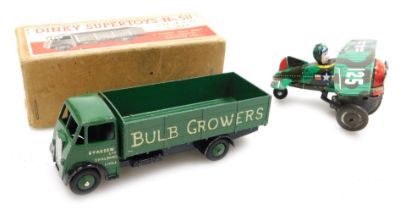 A Dinky Super Toys Guy 4-ton lorry, number 511, boxed, together with a Louis Marx and Company tin pl
