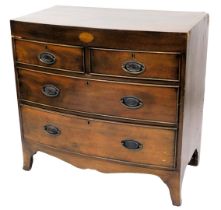 A 19thC mahogany bow fronted chest of drawers, the plain frieze with an oval patera above two short