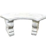A concrete garden seat, with a curved top, raised on scroll ends, 102cm wide.