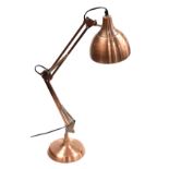 A coach house coppered metal anglepoise type table lamp, 75cm high.