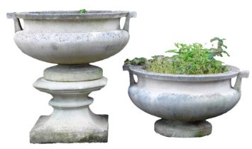 A pair of reconstituted stone two handled garden urns, one with plinth, each urn 36cm high, 63cm wid