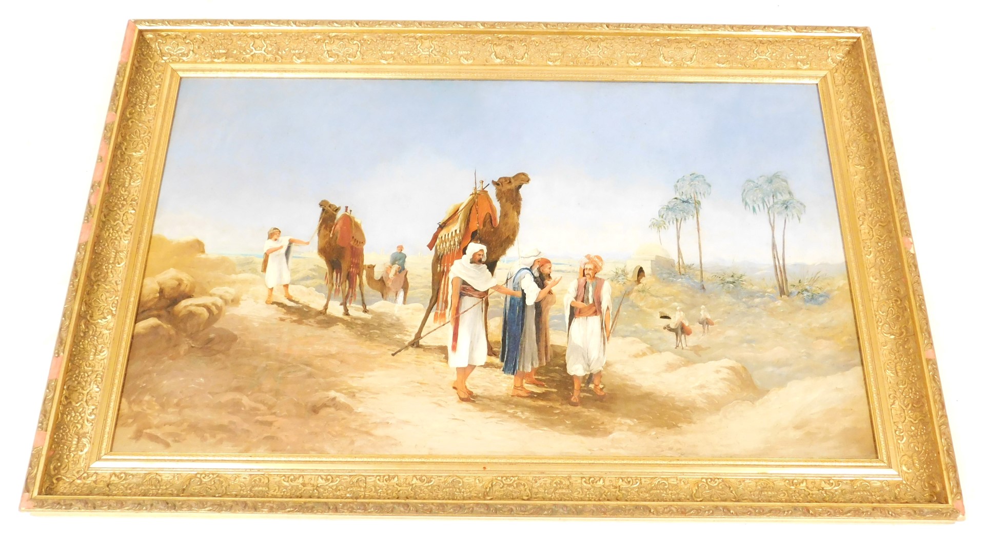 British School (20thC). A desert scene with bedouins, camels, palm trees and a city in the distance, - Image 2 of 2