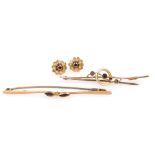 A pair of Edwardian 9ct gold and amethyst bar brooches, together with a pair of 9ct gold and garnet