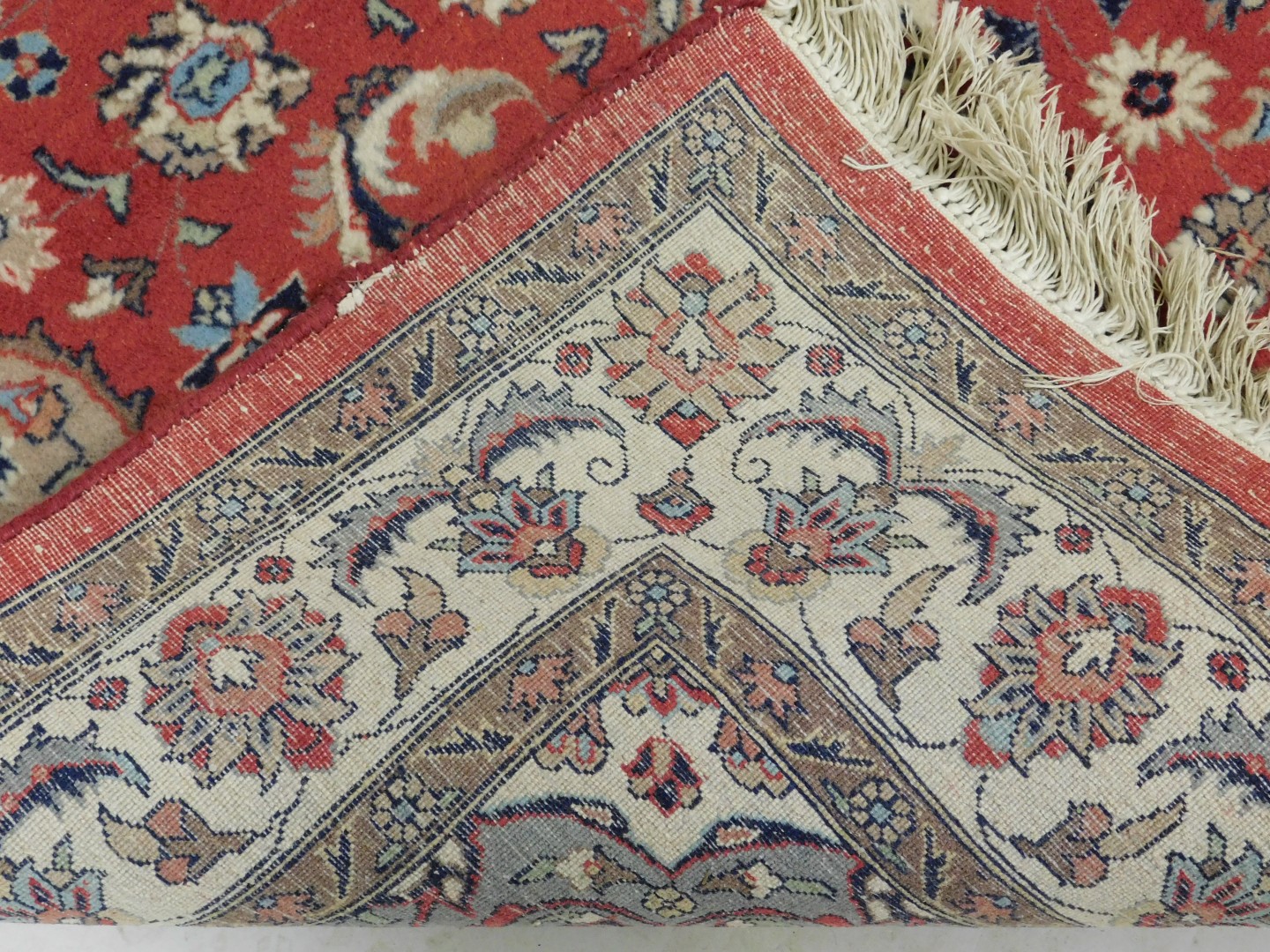 A Persian design rug, with central red ground gul, beige and grey borders, 195cm x 130cm. - Image 3 of 3