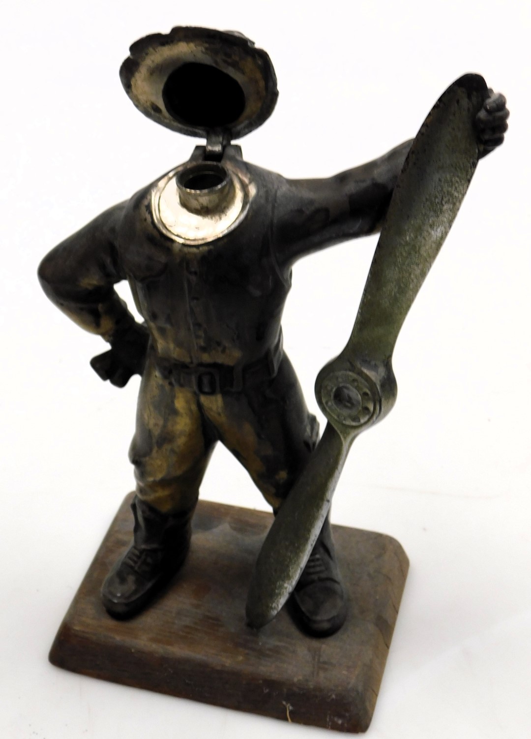 A 1930s silver plated aviator lighter, modelled as a pilot holding a propeller, on an oak base, 27cm - Image 2 of 2