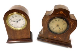 An early 20thC Smiths mahogany cased mantel clock, silvered dial bearing Arabic numerals, eight day