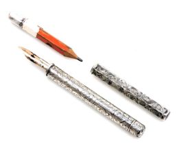 A Samson Mordan and Company propelling pen and pencil, white metal, with foliate engraving, together