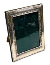 An Elizabeth II silver strut photograph frame, with Celtic knot decoration, London 2001, 22.5cm x 18