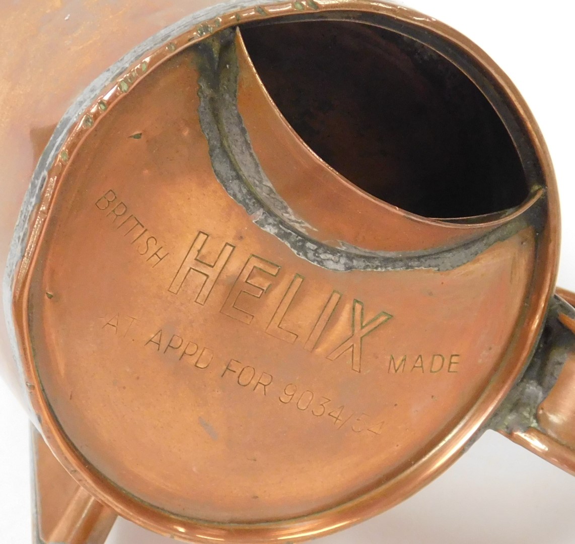 An early 20thC Helix copper oil can, 9034/54, 13.5cm high, together with a Clamfor pigeon oil lamp, - Image 2 of 3