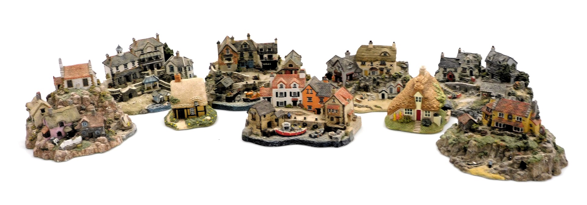 A group of Lilliput Lane and Danbury Mint sculptures, including Salters Quay, Fisherman's Cove, The
