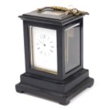 A late 19thC French ebonised striking carriage clock, by Henrymarc a Paris, rectangular enamel dial