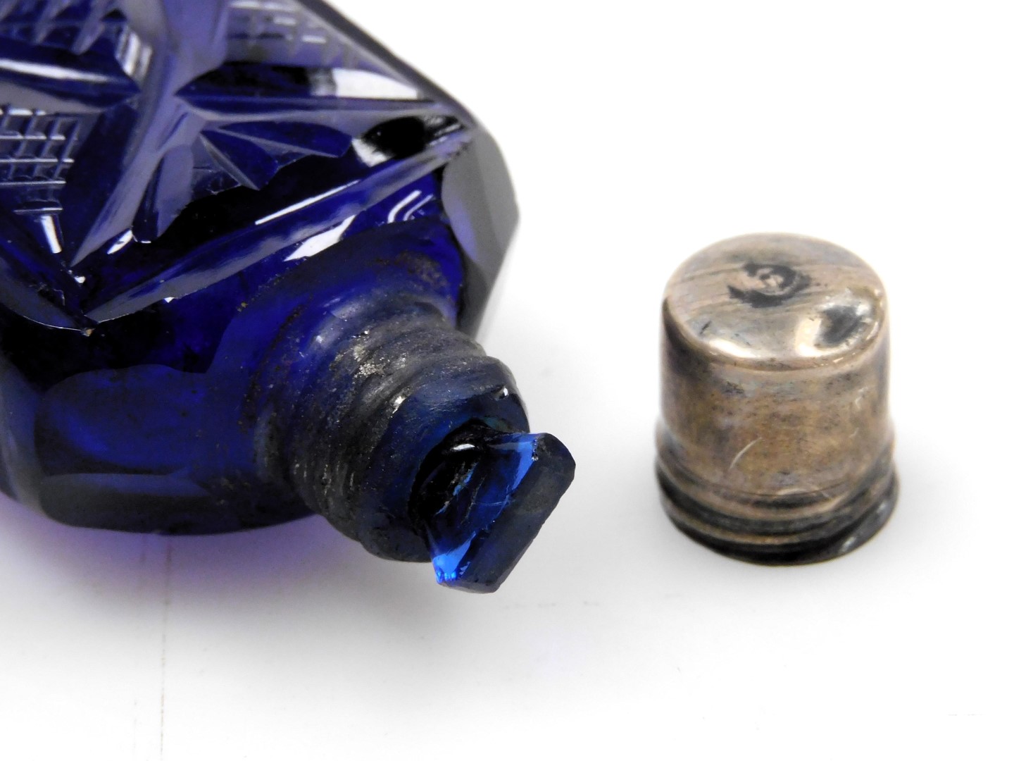 Three Victorian cut glass scent bottles, one of blue flushed waisted form, with a plated mount and h - Image 2 of 4