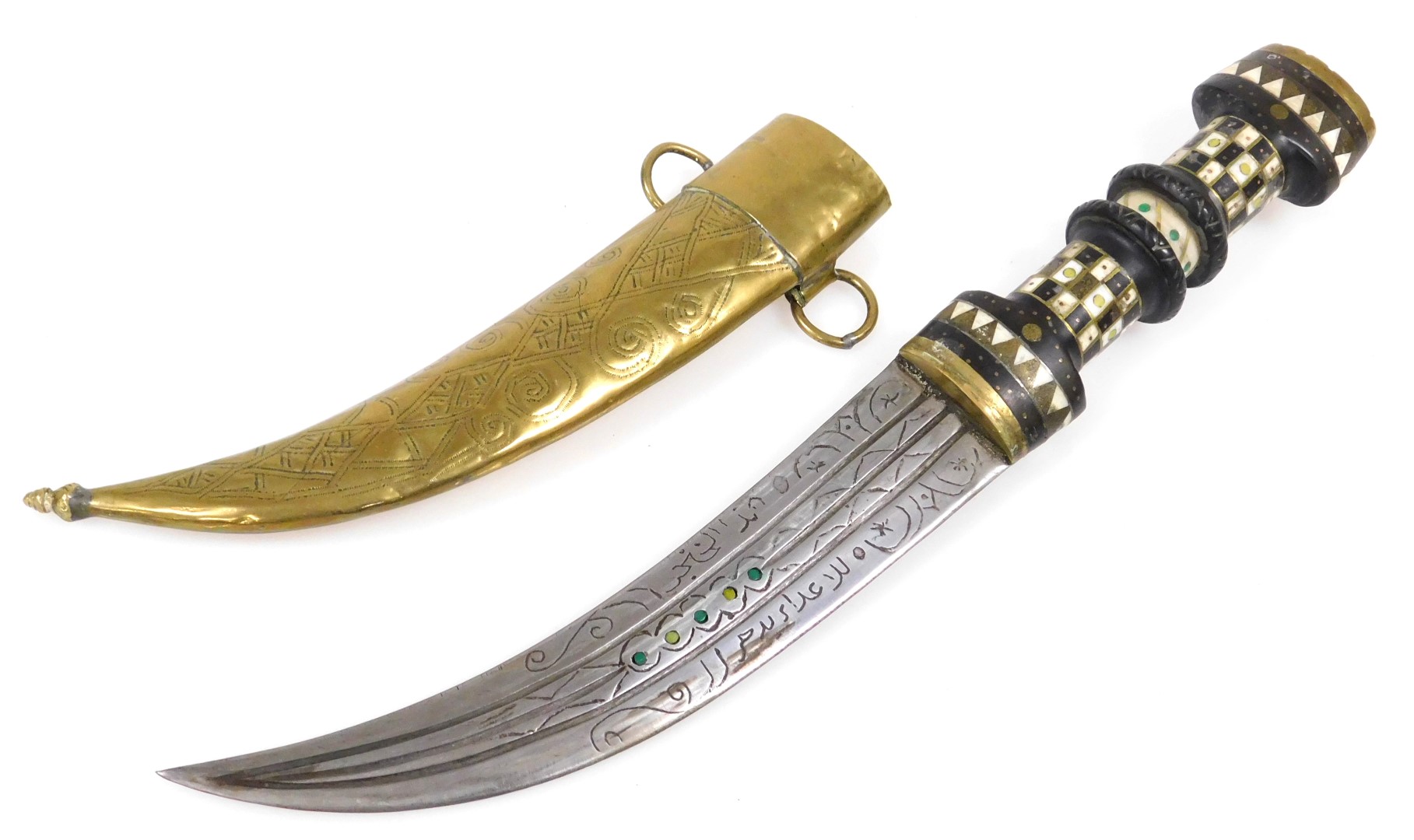 A 20thC Syrian Magdali dagger with a brass capped and inlaid ebony hilt, curved double edge blade an