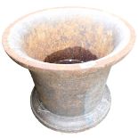 A cast iron garden planter, of mortar type, 35cm high, 41cm diameter.