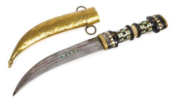A 20thC Syrian Magdali dagger with a brass capped and inlaid ebony hilt, curved double edge blade an