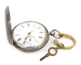 A Victorian silver cased hunter pocket watch, key wind, circular enamel dial bearing Roman numerals,