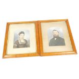 A pair of 19thC over painted photographs, portraits of a gentleman and lady, in a burr maple frame,