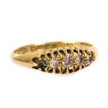 An 18ct gold and diamond five stone ring, set with rose cut diamonds, in a claw setting, size N, 2.5