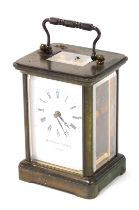 A Matthew Norman of London brass case carriage clock, rectangular dial bearing Roman numerals, singl