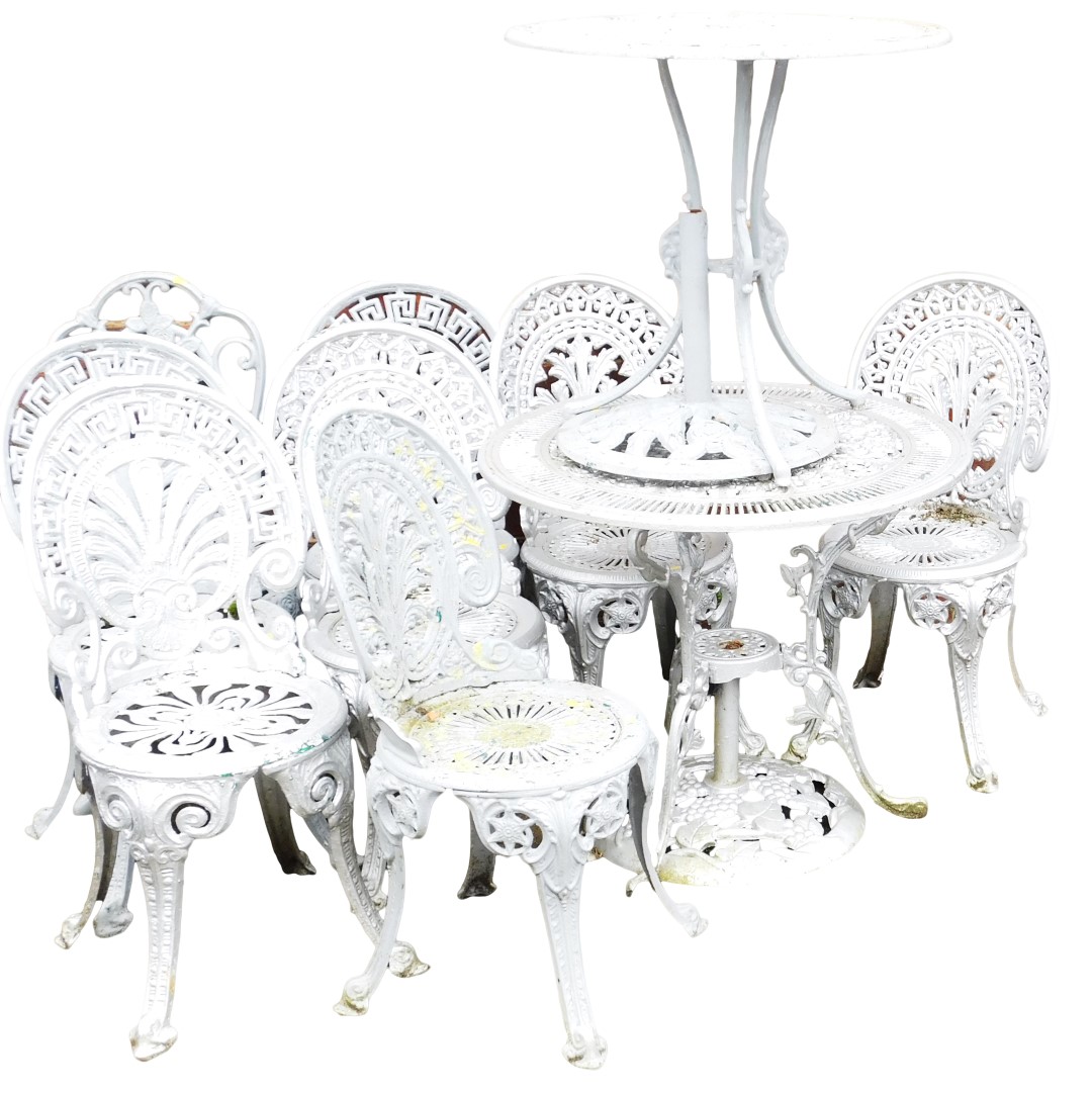 Eight silver and grey painted cast aluminium Victorian style garden chairs, each on cabriole legs an