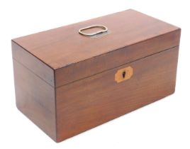 A Georgian mahogany tea caddy, of rectangular section, with an inlaid key escutcheon and white metal
