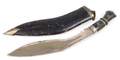 A 20thC Kukhri, with an inlaid horn handle, and leather scabbard, 45cm long.