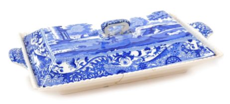 An early 20thC Copeland Spode's Italian pattern blue and white pottery dish, cover and drainer, (AF)