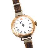 A mid century 9ct rose gold cased lady's wristwatch, circular white enamel dial bearing Roman numera