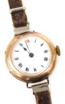 A mid century 9ct rose gold cased lady's wristwatch, circular white enamel dial bearing Roman numera
