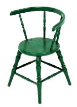 A 19thC green painted child's Windsor chair.