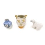 A Lladro porcelain figure of a polar bear, Fieldings Crown Devon pottery Art Deco vase, of twin hand